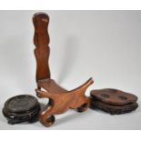 A Collection of Three Various Oriental Wooden Stands