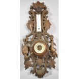 A French Carved Wall Barometer Surround Depicting Hunting Dog and Game with Later Replacement