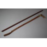 A Child's Plaited Leather Bone Handled Riding Crop and a Leather Swagger Stick
