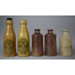 A Collection of Five Vintage Stoneware Bottles Including Gomer Jones, Nantwich for Ginger Beer