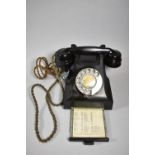 A Vintage Bakelite Telephone with Pull Out Number Drawer