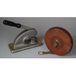 A Leather Cased Rabone Linen Tape Measure Together with a Letter Embosser or Stamp for Ewels and