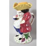 A Large Staffordshire Snuff Taking Toby Jug, Usual Coloured Enamels, One Arm AF, 27cm high
