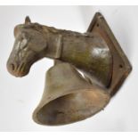 A Wall Mounting Cast Iron Novelty Bell in the Form of a Horses Head, 17cm high