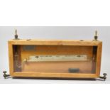 A Negretti and Zambra Spirit Level Gauge in Wooden Case, 56cm Wide