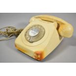 A Vintage Cream Telephone, Stained