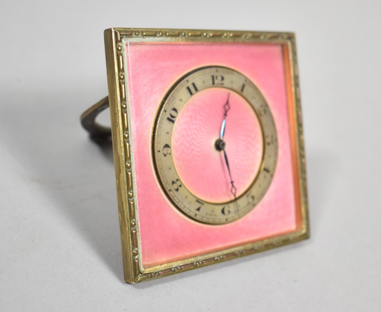 A Vintage Pink Enamel Travel Clock with Easel Back Stand, Movement Overwound, 6.5cm Square