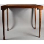 An Edwardian Inlaid Rectangular Bed Tray with Folding Legs, 68cm wide