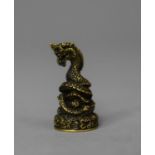 A Small 19th Century Bronze Seal Modelled as a Coiled Dragon, 2cm high