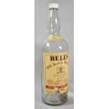 An 18 Pint Bottle for Bells Whisky, 50cm high