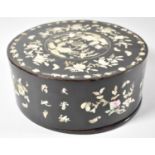 A Japanese Late Edo/Early Meiji Period Circular Lacquer Box and Cover with Mother of Pearl Inlaid