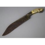 A Ceylonese Piha Kaetta Pistol Grip Dagger with Fullered Steel Blade and Engraved and Gilt