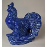 A Large Blue Glazed Ceramic Study of a Cockerel, 35cm high