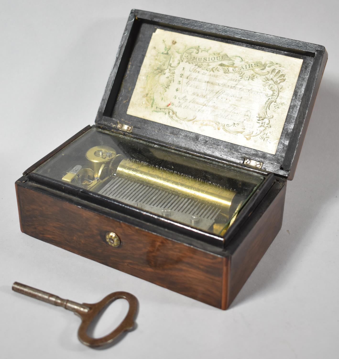 A Small French Rosewood Musical Box with 8cm Barrel Playing Six Airs entitled on Inner Paper