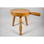 A Small Circular Topped Three Legged Stool with Carrying Handle, 26cm Diameter