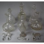 A Collection of Various Decanters and Stoppers