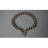 A Silver Bracelet, Padlock Locket and Safety Chain, London 1977, 30g