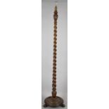 An Edwardian Oak Barley Twist Standard Lamp of Tapering Form with Circular Base