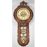 A Mid 20th Century Pressed Moulded Wall Hanging Clock with Battery Movement, 64cm High