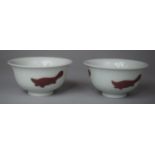 A Pair of Chinese White and Peach Blossom Porcelain Tea Bowls Decorated with Beaver Silhouettes, 4.