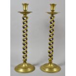 A Pair of Open Spiralled Brass Candlesticks, 41cm high