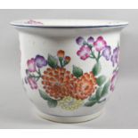 A Large Oriental Planter Decorated in Polychrome Enamels with Chrysanthemums and Flowers, 31cm