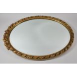 A Mid 20th Century Oval Gilt Framed Wall Mirror, 57 high