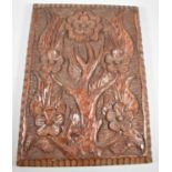 A Carved Wooden Rectangular Panel Decorated with Flowers, 43cm x 32cm