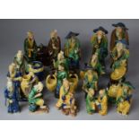 A Collection of Seventeen Various Sancai Glazed Oriental Mud Men Figures
