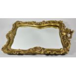 A Mid 20th Century Ornate Gilt Framed Wall Mirror, 57 cm high