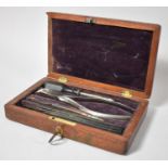 A Late 19th Century Mahogany Cased Set of Medical Instruments, 18.5cm wide