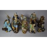 A Collection of Ten Various Mud Men Figures, Mainly Fishermen