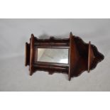 A Mid 20th Century Mahogany Wall Hanging Corner Shelf/Cabinet with Mirrored Door, 117cm high