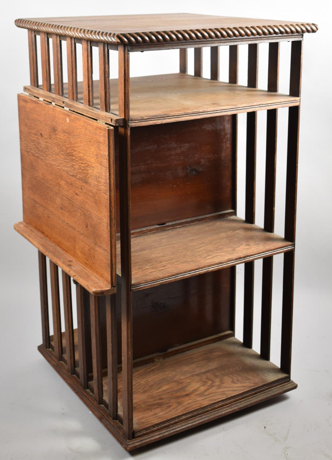 An Edwardian Oak Revolving Bookcase with Hinged Lectern, 93cm high