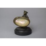 A Late 19th Century Mother of Pearl and Bronze Anthropomorphic Study of a Monkey Holding Mother of
