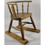 A 19th Century Elm Seated Child's Chair Now Mounted on Pine Support Rails