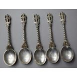 A Collection of Five White Metal Indian Coffee Spoons, The Finials Modelled as Ganesh, 97g