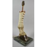 An Early 20th Century Novelty Taxidermy Table Lamp Formed From a Zebra Front Leg on Marble Plinth,
