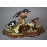 A Beswick Tree Stump Bird Stand Containing Five Beswick Birds, Some At Fault