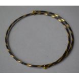 An Elephant Hair and Gold Bangle, for Strength