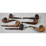 A Collection of Six Vintage Carved Briar Pipes and One Rocket Nylon Range Example