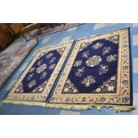 A Pair of Patterned Rugs on Blue Ground, 170x120