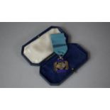 A Cased Silver and Enamel Medal for Long Service, The National Operatic and Dramatic Association