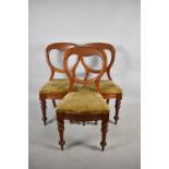 A Set of Three Mahogany Late Victorian Balloon Back Dining Chairs