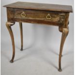 A 19th Century Oak Side Table with Single Drawer Having Brass Drop Handles on Extended Cabriole