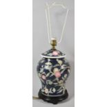 An Oriental Ceramic Vase Shaped Table Lamp with Fruit Decoration