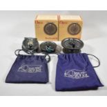 An Orvis Battenkill 5/6 Fishing Reel with Two Extra Spools, One Unrelated with Canvas Pouch and