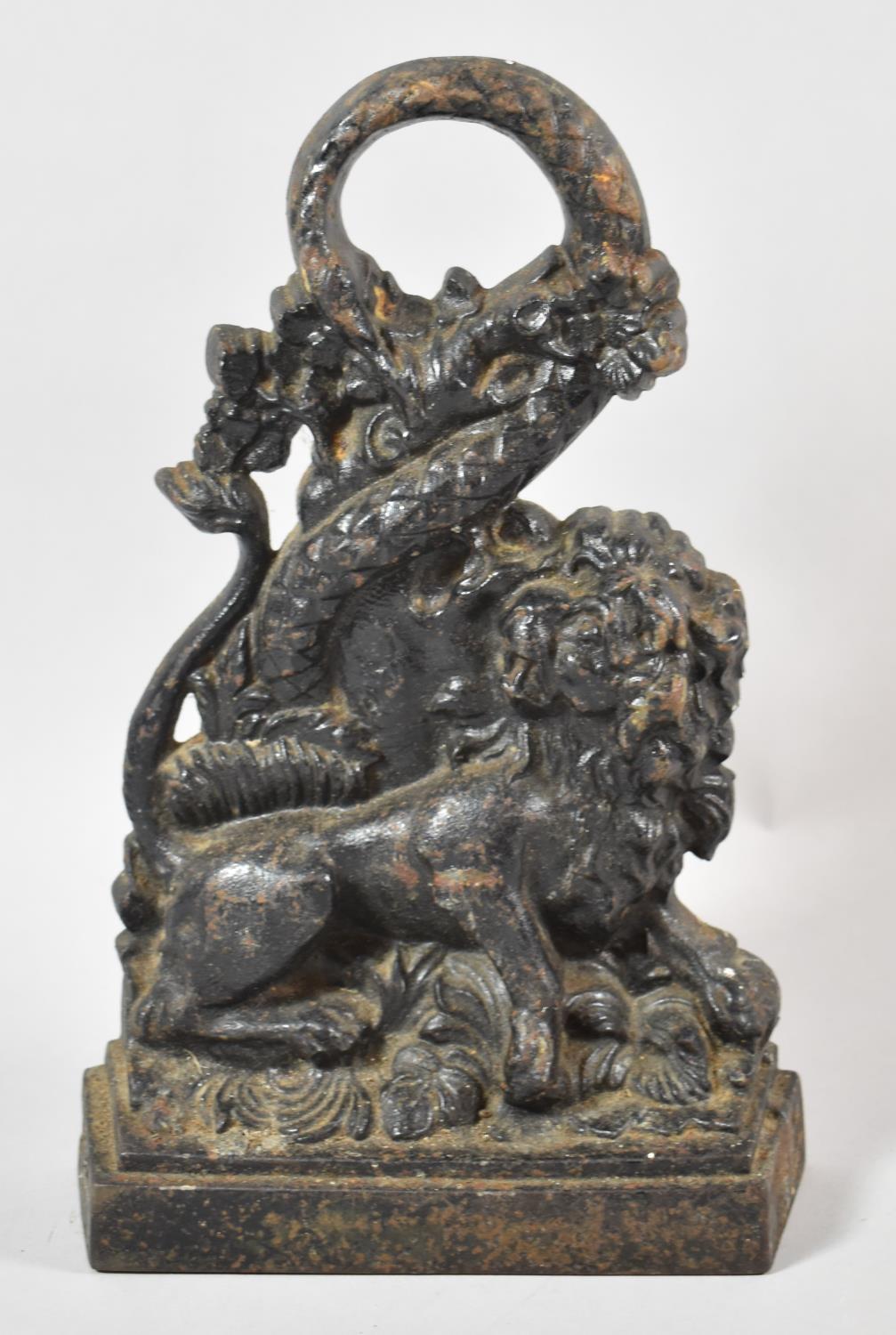 A 19th Century Cast Iron Door Stop in the Form of Lion and Snake, 29cm high