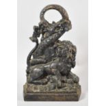 A 19th Century Cast Iron Door Stop in the Form of Lion and Snake, 29cm high