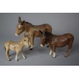 A Beswick Donkey Family